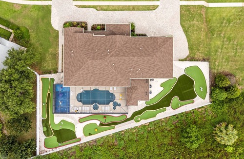 West Kissimmee House | Mini Golf, Splash Pad, Indoor Playground, Movie Theatre & Summer Kitchen