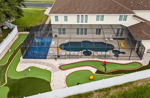 West Kissimmee House | Mini Golf, Splash Pad, Indoor Playground, Movie Theatre & Summer Kitchen