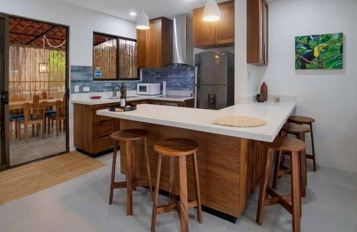 Coco Apartment | Minimalist Condo with a Beautiful New Design, Enclosed Patio, and Shared Community Pool