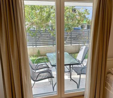 Olymbiaki Akti House | Minimalist Seaside Apartment with Private Patio and Parking - Blue Zone Homes