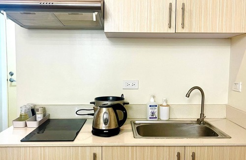 Sasa Condo | Minimalist Studio condo unit near Davao International Airport with AC, WiFi