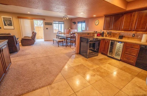 Colorado Springs Condo | Minutes from Everything | Hot Tub | Grill | Views | King Bed
