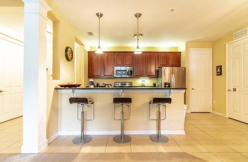 Florida Central Atlantic Coast Condo | Minutes to everything. Desirable Ground Floor Condo in Vista Cay |Lanai |Across from Epic Universe