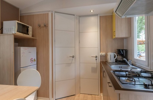 Lavilledieu RV Rental | Mobile Home 'Mobil-home C - 1-4 Pers' with Shared Pool, Private Terrace and Shared Garden
