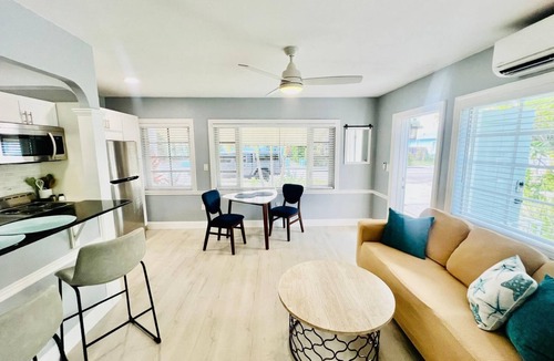 Parrot Cove Apartment | Modern 1 bedroom villa with King Bed just five minutes to the beach!