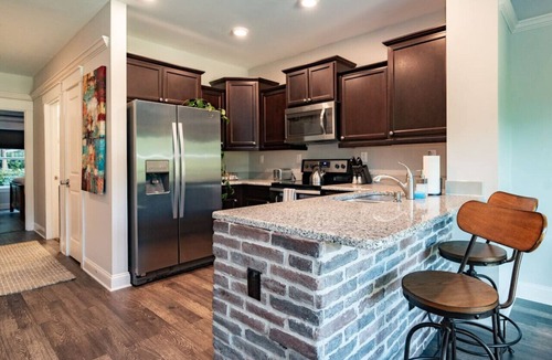 Central Business District Apartment | Modern 1BR Flat: Free Parking, AC, Getaway Ready!