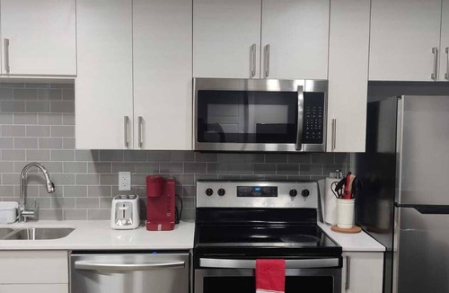 West Edmonton Apartment | Modern 1BR Mini Guest Suite near WEM