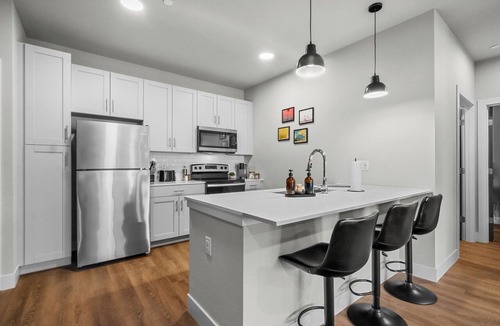 Rogers Apartment | Modern 1BR Near Walmart, AMP & Bike Lift