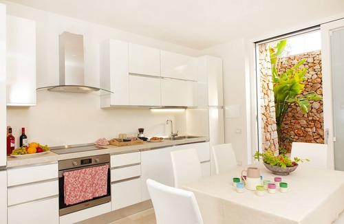 Marina di Felloniche Villa | Modern 2-unit villa with heated pool and seaview