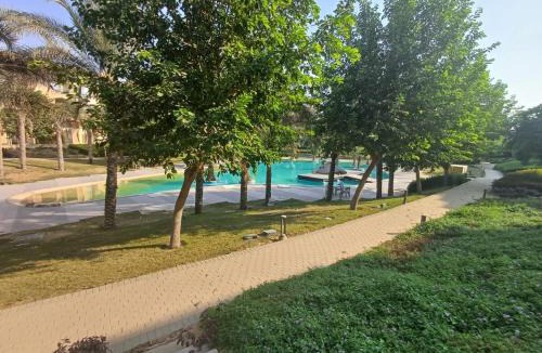 Cairo Apartment | Modern 2BR Apartment with Private Garden Patio, Stone Residence New Cairo
