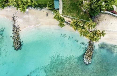 Little Battaleys Apartment | Modern 2BR Beachside Haven Ground Floor and Pool