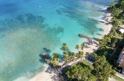 Little Battaleys Apartment | Modern 2BR Beachside Haven Ground Floor and Pool