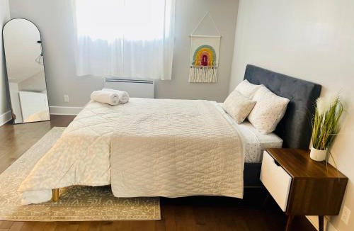 Saint-Hubert Apartment | Modern 2BR Suite - 3 Beds- Sleeps 6 - Free Parking - Near Montreal