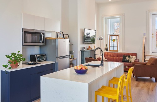 Logan Circle Apartment | Modern 2BR Treetop Oasis in Historic Home on Logan Circle.