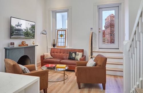 Logan Circle Apartment | Modern 2BR Treetop Oasis in Historic Home on Logan Circle.