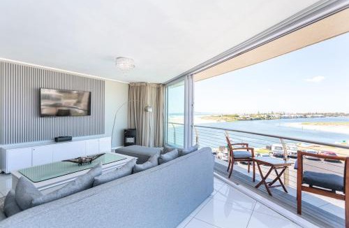 Lagoon Beach Apartment | Modern 2BR w Ocean Views Pool Access by CTHA