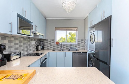 Lagoon Beach Apartment | Modern 2BR w Ocean Views Pool Access by CTHA