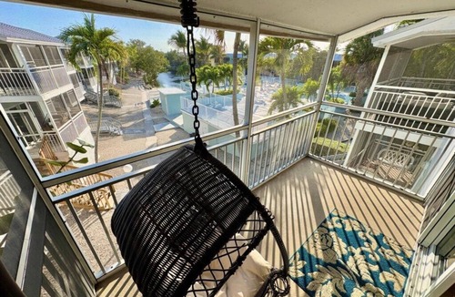 Rock Harbor House | Modern 3-Story Oceanside Townhouse with a Lagoon, Water views at Resort! Keys