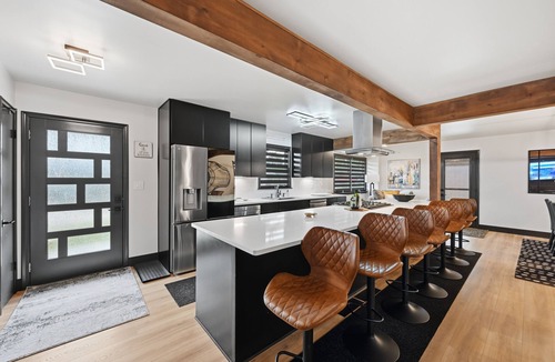 South Central Omaha House | Modern 4-bedroom Bee Hive with open floor plan & easy access to the interstate.
