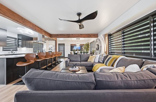 South Central Omaha House | Modern 4-bedroom Bee Hive with open floor plan & easy access to the interstate.