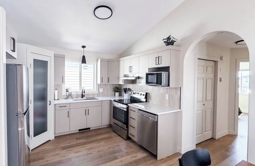 Grande Prairie House | Modern 4BR | Walk to Eastlink | Sleeps 8