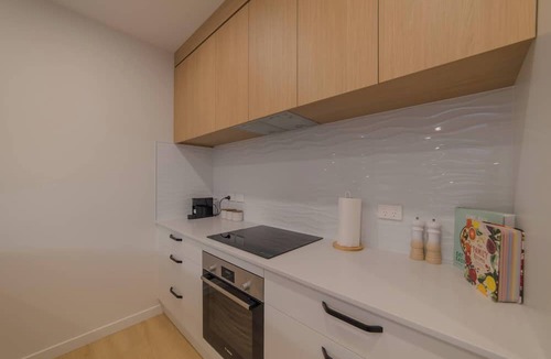 Hornby Apartment | Modern 4BR with Billiards & Bright Living