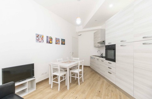 Vittoria Apartment | Modern 70 m2 apartment located on the mezzanine floor of an elegant condominium, a stone's throw from Piazza Statuto, in an ideal position for being able to move around the city comfortably.The Principi D'Acaja subway stop is 1 km away, the Porta Susa