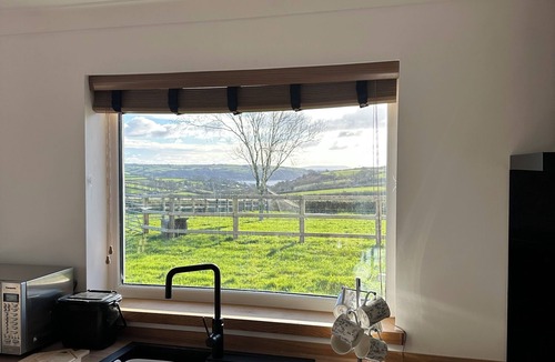 Llanybri House | Modern accommodation with scenic views of Llansteffan.