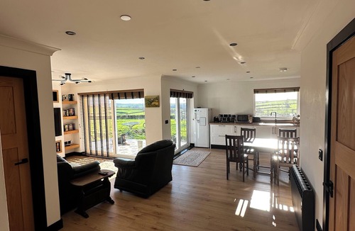 Llanybri House | Modern accommodation with scenic views of Llansteffan.