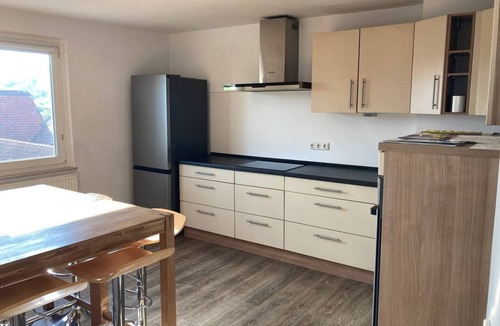 Grettstadt Apartment | Modern and high-quality furnished penthouse (125 sqm) with balcony and free WiFi