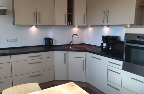 Grettstadt Apartment | Modern and high-quality furnished penthouse (125 sqm) with balcony and free WiFi