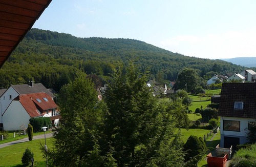 Siekholz Apartment | Modern apartment with air conditioning, porch, garden, sunbathing area, gazebo, pond