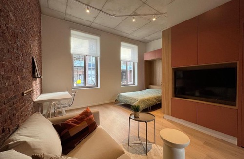 Mellet Apartment | Modern apartment in Bree with parking