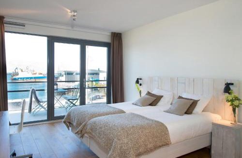 Vissershaven Apartment | Modern apartment in the harbor of Schevening