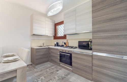 Budoni House | Modern Apartment with Air Conditioning and Garden; Pets Allowed