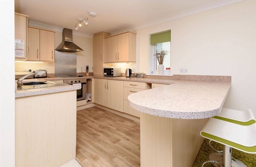 Looe House | Modern apartment with stunning views over Looe harbour.