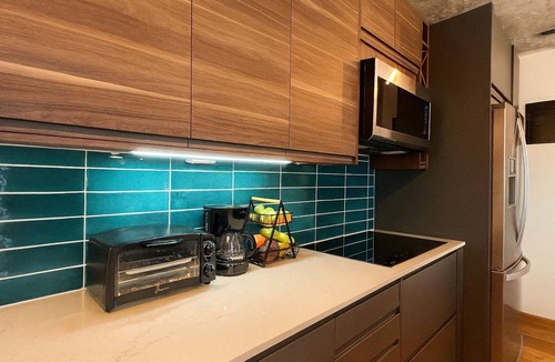 Condado Condo | Modern Beachfront 2BR 2BA Condo, Pool & Gym Steps to Dining Superhost