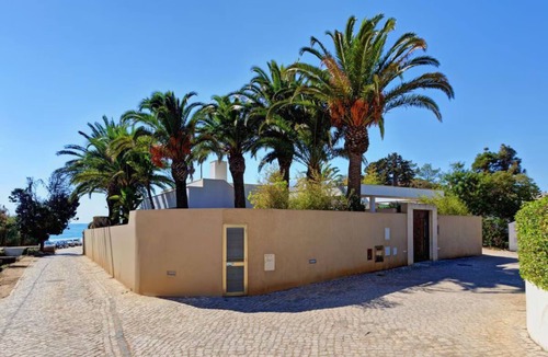 Praia da Luz Villa | Modern beachfront villa with heated pool and jacuzzi, ideal for families