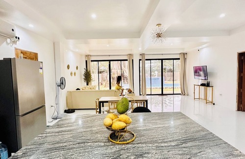 Manukan Villa | Modern beachside oasis w/pool 2bed 2bath villa with AC, WiFi in Manukan.