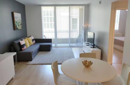 Boynton Beach House | Modern bedroom in great condo! Beach Pass incl!