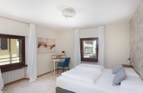 Riva del Garda Apartment | Modern, Centrally Located Apartment "RivApartmentsDowntowN - Love" with a View of the Old Town of Riva del Garda, A/C & Wi-Fi