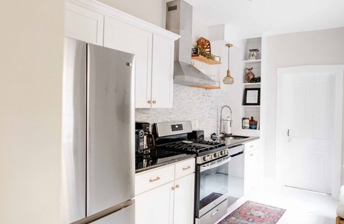 Lancaster House | Modern City home with off street parking, fenced backyard