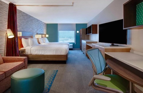 Garden Grove Hotel | Modern Comforts! Pool, Parking, Breakfast. Minutes to Discovery Science Center!