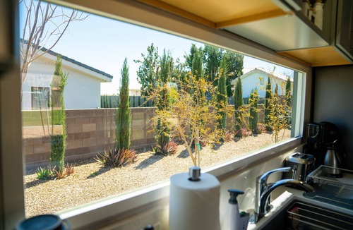 Las Vegas Cabin | Modern container home in Las Vegas with own soccer field and trees.