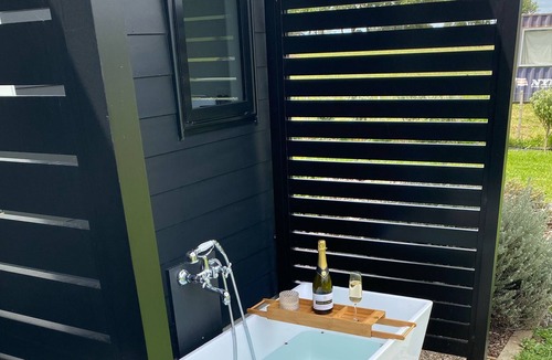 Raglan House | Modern, cozy, Beachy Bach with beautiful rural views in Raglan