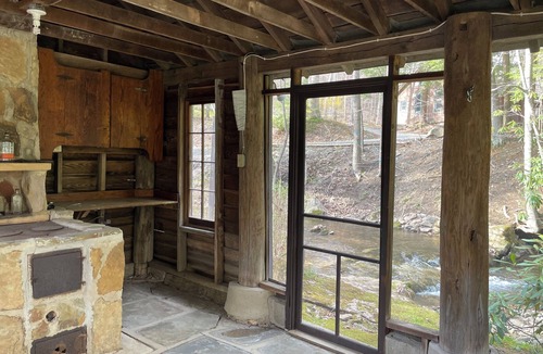 Champion Ski Chalet | Modern creekside chalet in Champion with private island minutes from 7 Springs