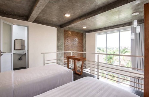 Pererenan Hotel | Modern, Deluxe Room with pool view #1