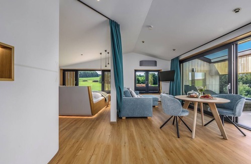 Breitenberg Apartment | Modern design apartment with a view of the valley. With sauna, roof terrace, outdoor bathtub and custom-made furnishings. Perfect for two adults who appreciate peace and quality.