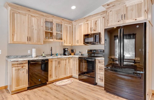 Conover Cabin | Modern dog-friendly cabin with hot tub, gas fireplace, patio, grill, & washer/dryer