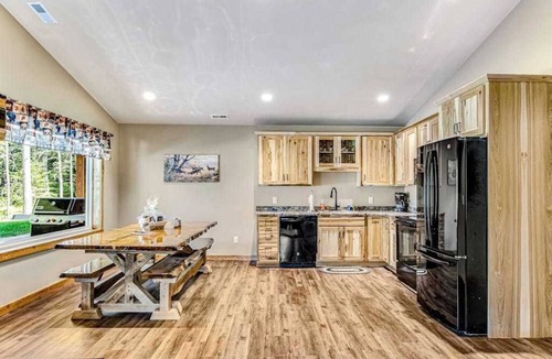 Conover House | Modern dog-friendly cabins with hot tub, fireplace, patio, grill, central AC, & W/D